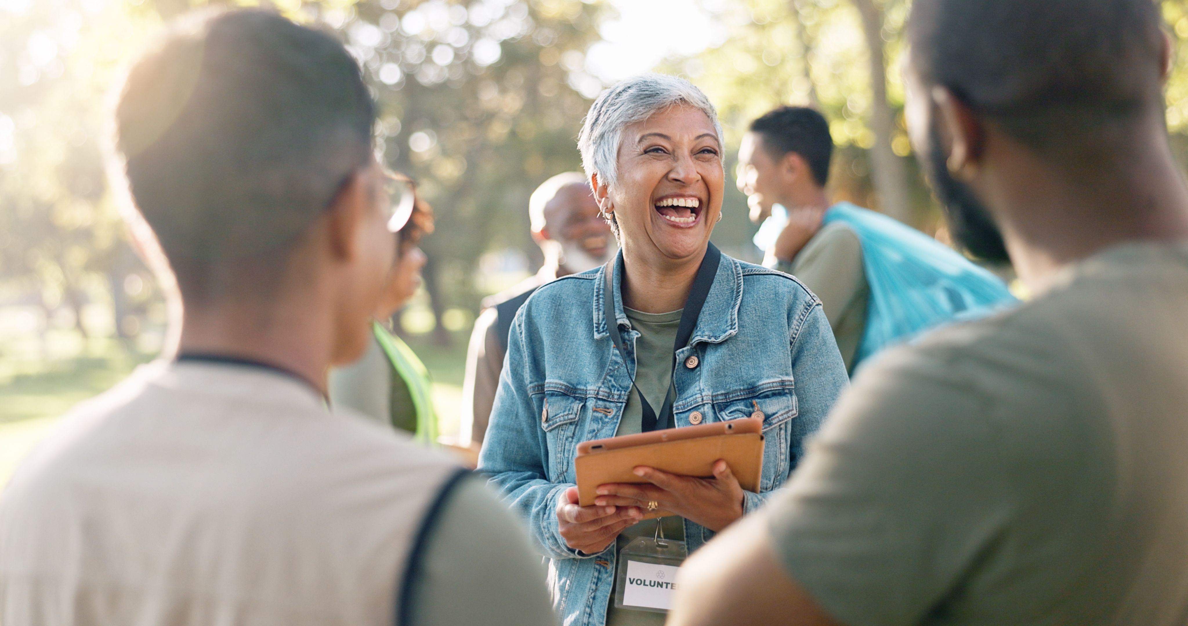 Woman laughing with community friends