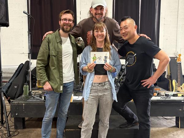 Me posing with the band I sketched