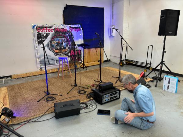 Brian Junker setting up the acoustic stage at art all night 29