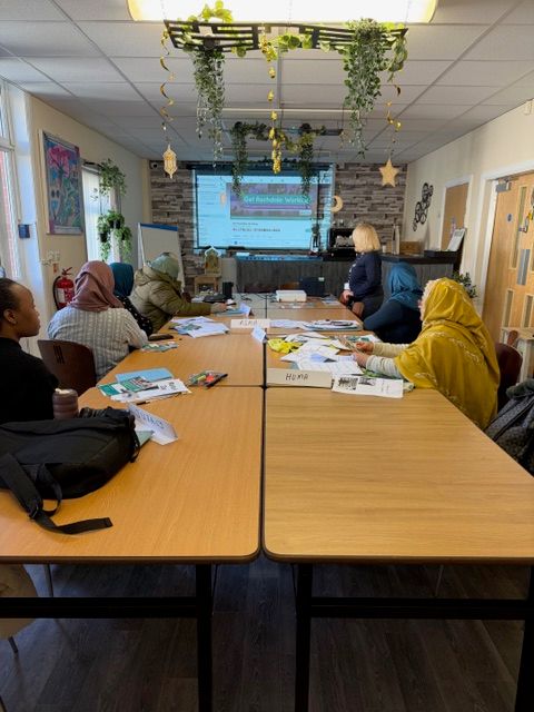 students sat around a table 