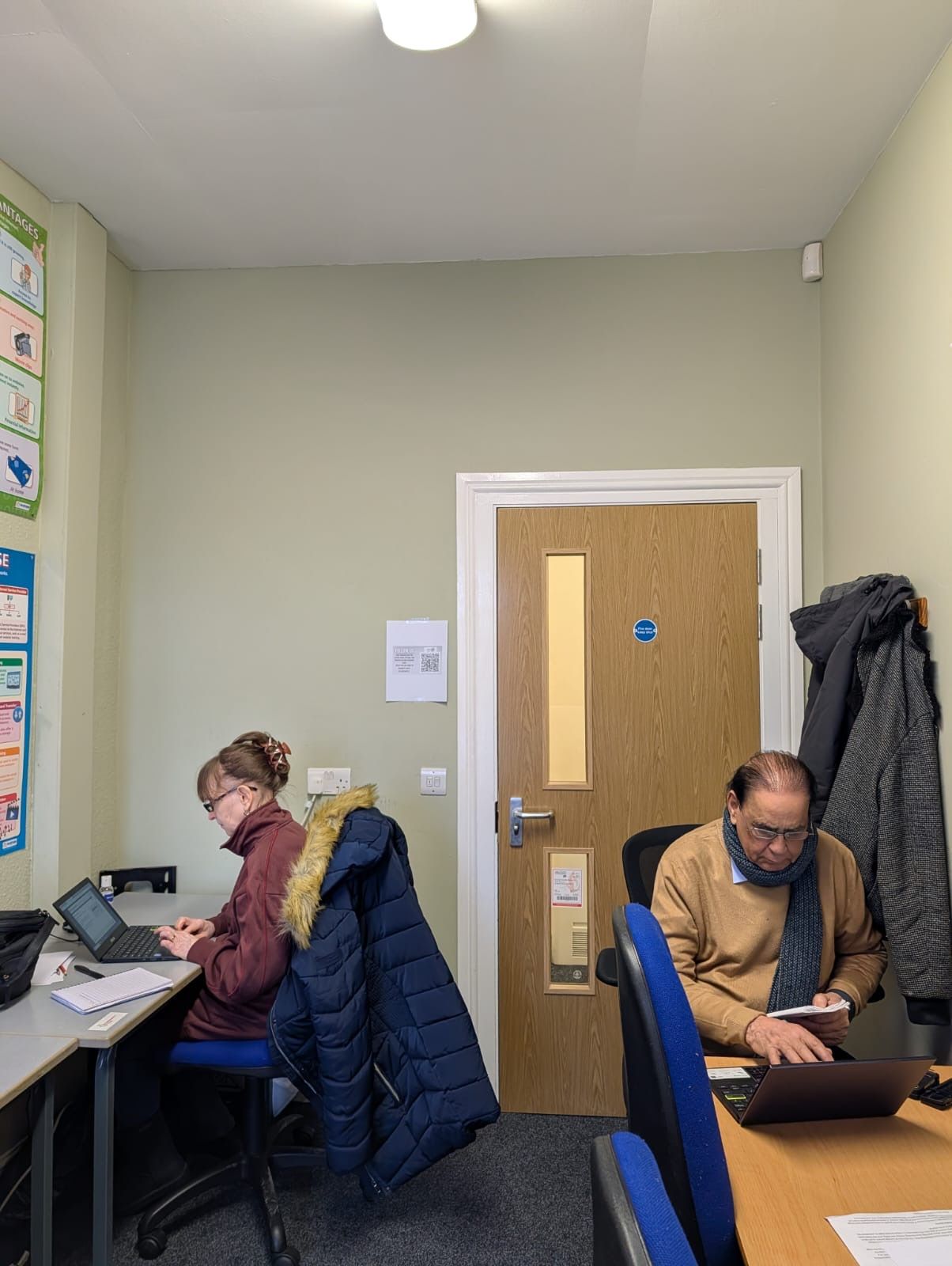 man and woman in a classroom