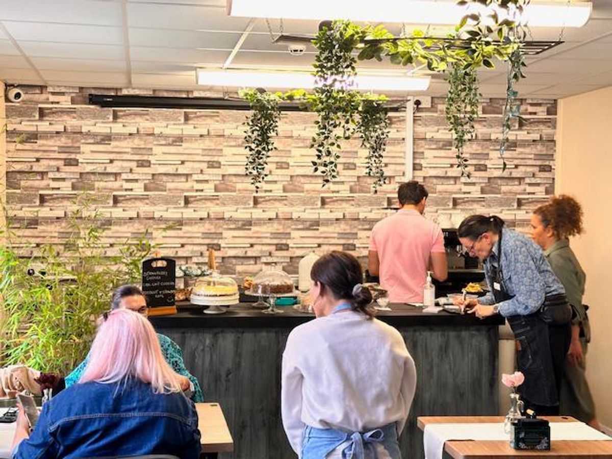 people eating in a coffee shop