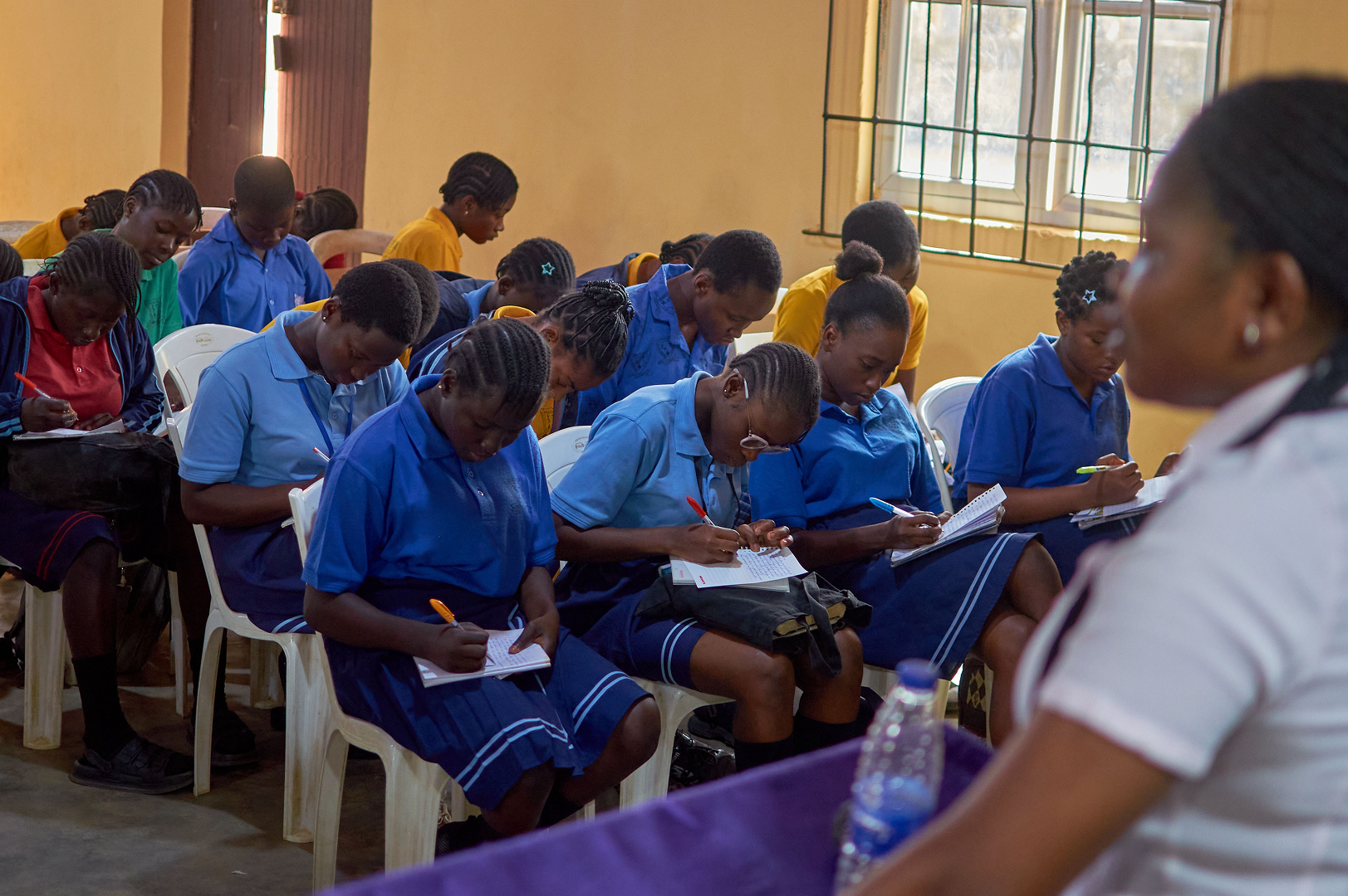 Students learning in a classroom