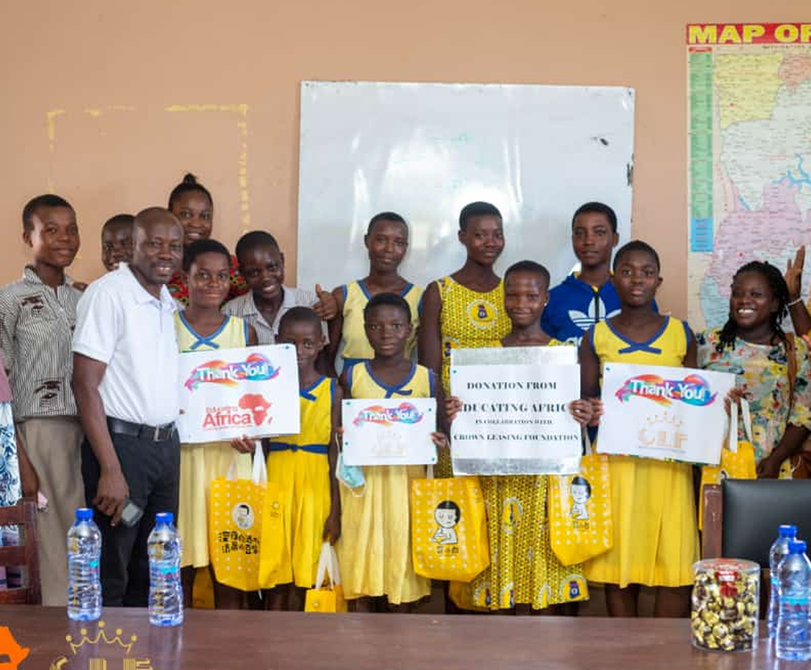 Students with certificates celebrating achievement