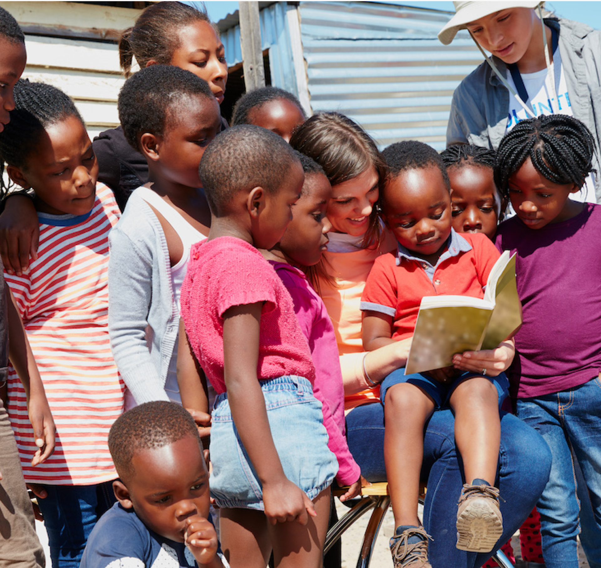 Volunteers with students