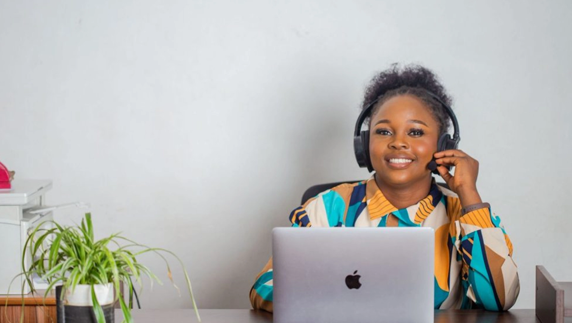 Educating Africa team member on a phone call