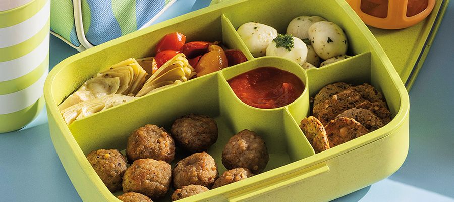 Schnucks Italian Meatballs with Schnucks Pasta Sauce, Schnucks Marinated Artichoke Hearts and Roasted Bell Peppers, mozzarella pearls and multi-see crackers