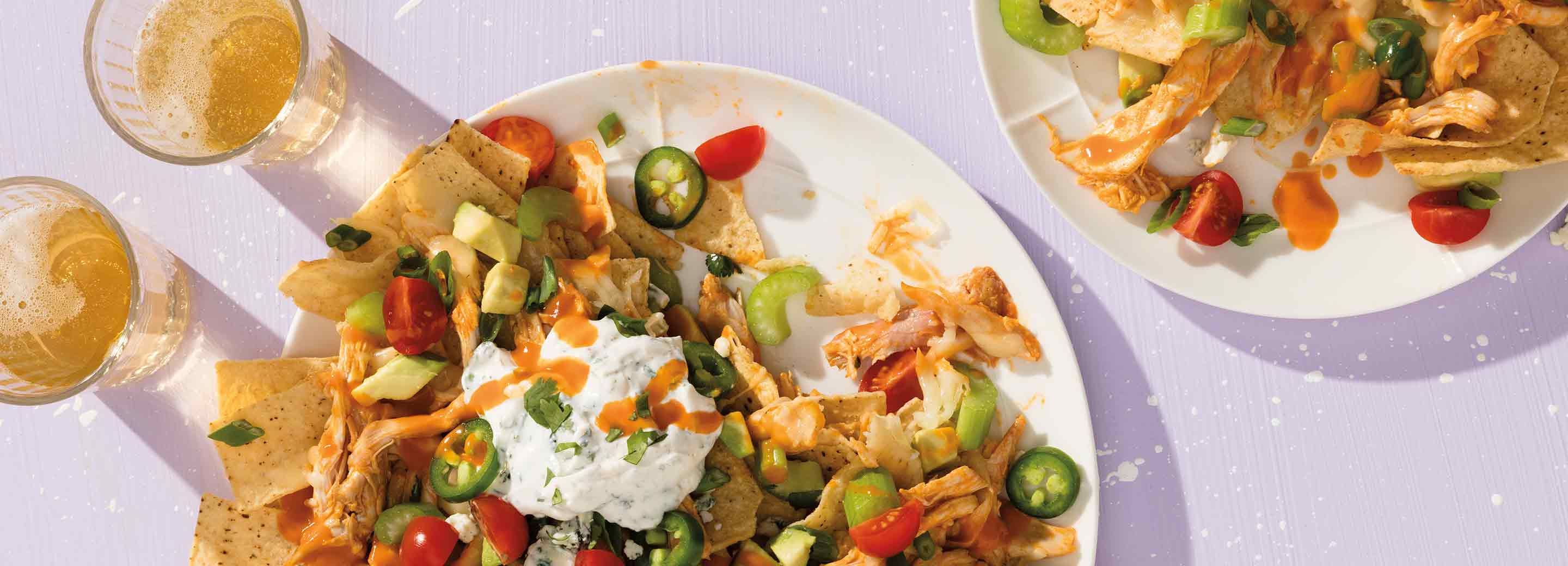 Loaded Buffalo Chicken and Veggie Nachos with Ranch Sour Cream | Schnucks