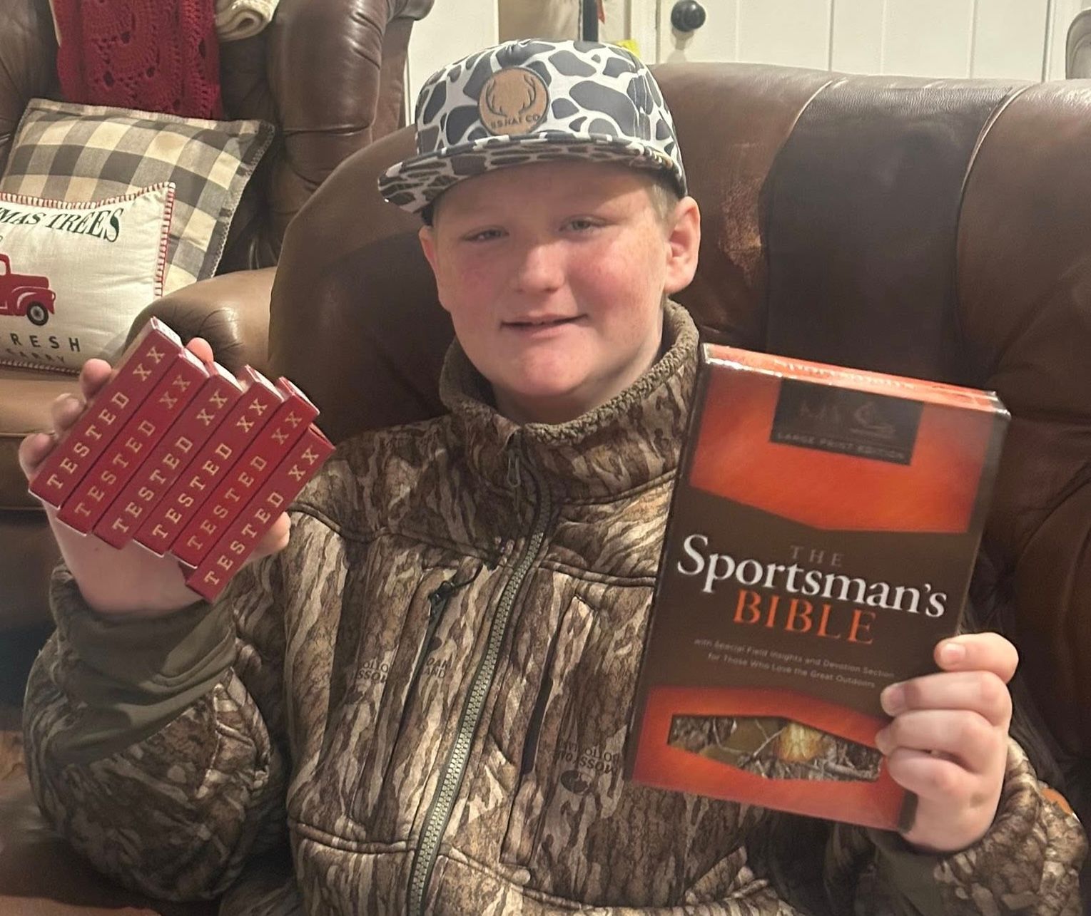 Will Roberts holding a book and deck of cards