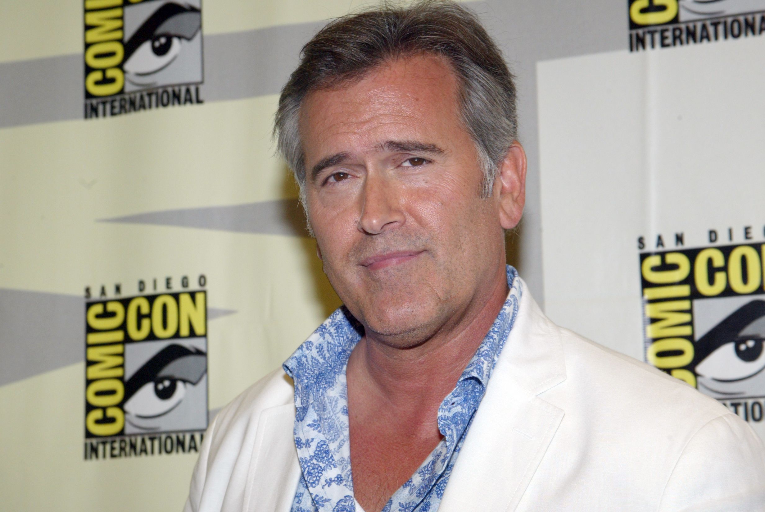 Bruce Campbell arrives in the press room for Burn Notice