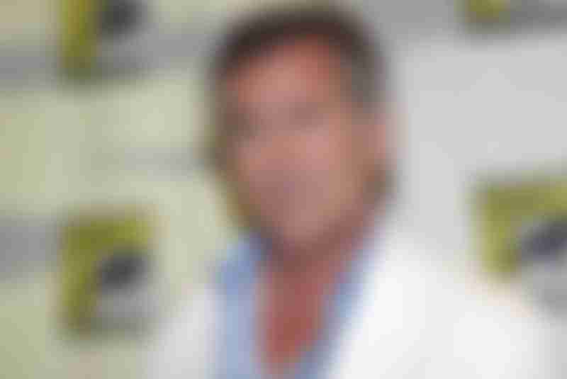 Bruce Campbell arrives in the press room for Burn Notice