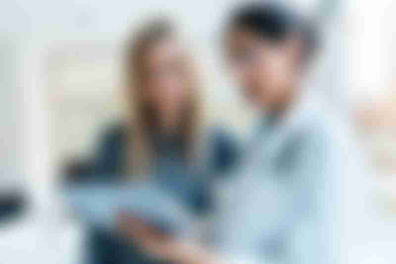 Woman and Doctor Look at Results