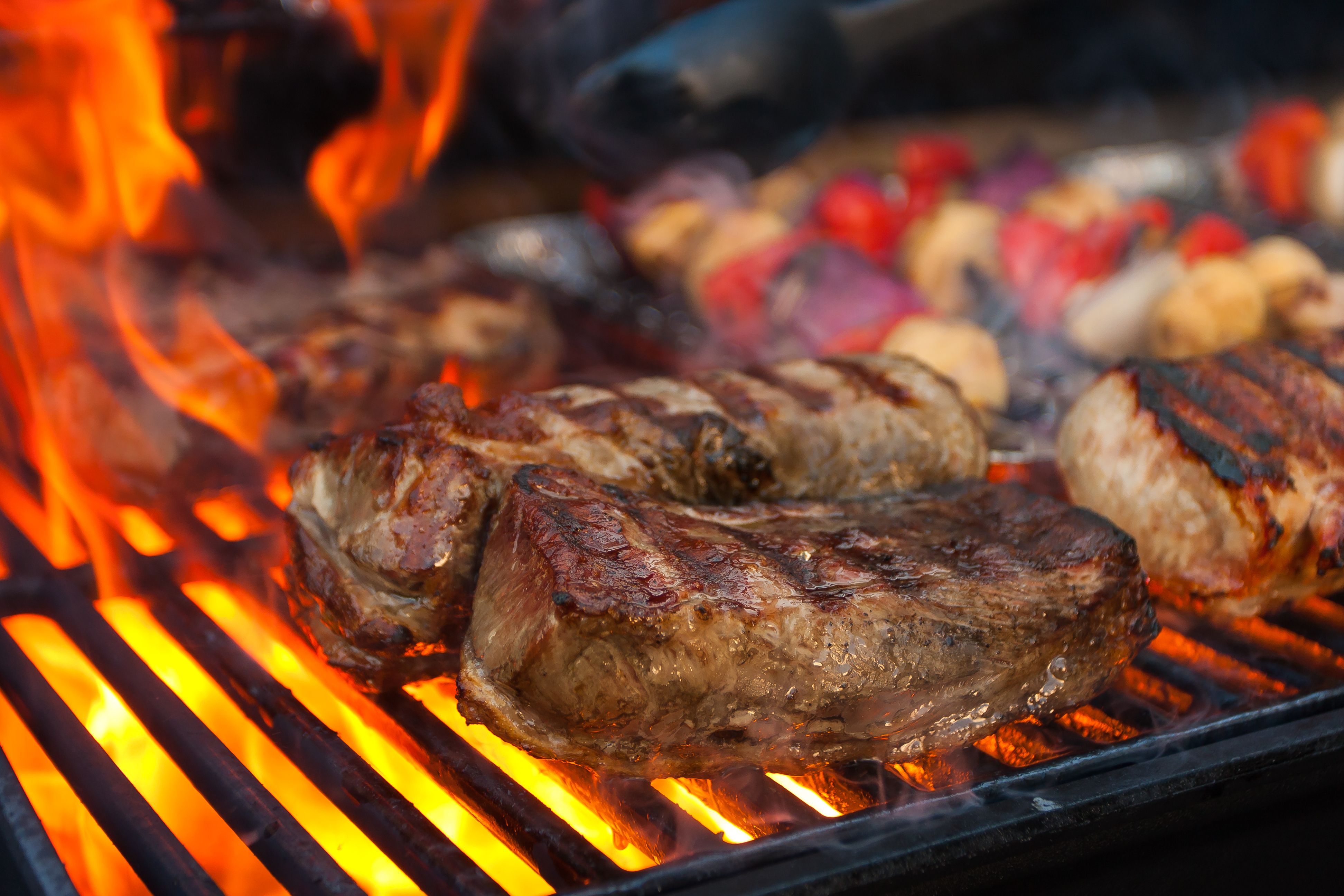 Meat and vegetables char-grilled over flame