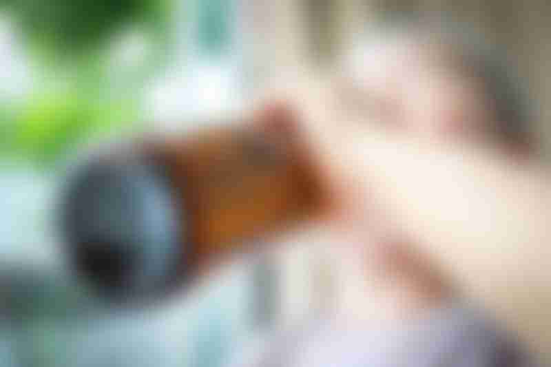 Man Drinking Alcohol