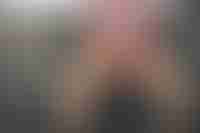 A man covering his private parts