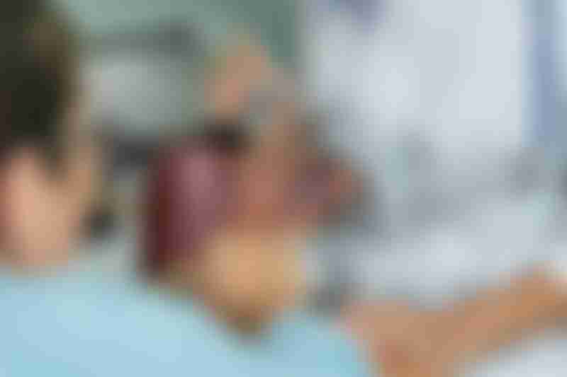 Doctor uses a liver model to explain how cirrhosis increases liver cancer risk
