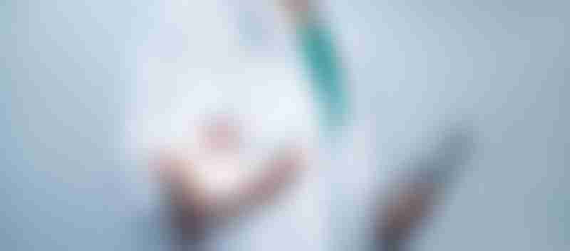 Medical worker hold virtual model of uterus and reproductive system