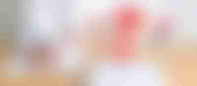 Doctor with uterus and ovaries anatomy model