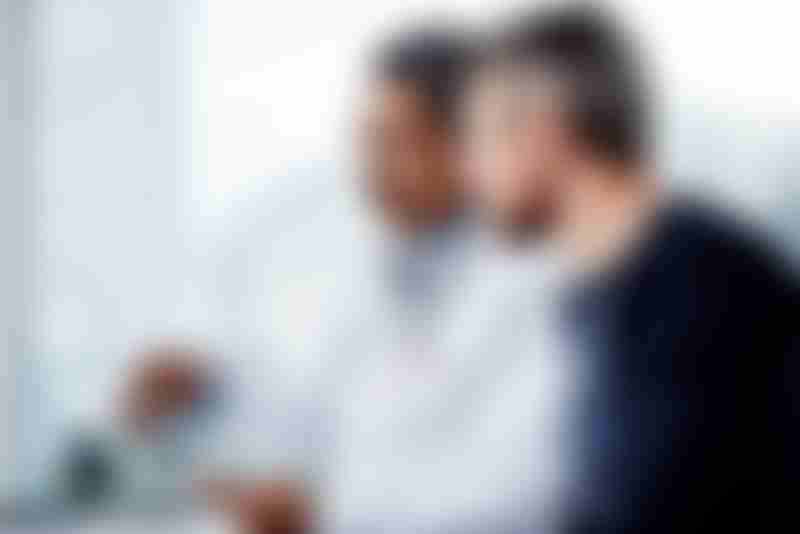 Doctor reviewing liver cancer statistics