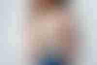 Young Woman Holding Breast