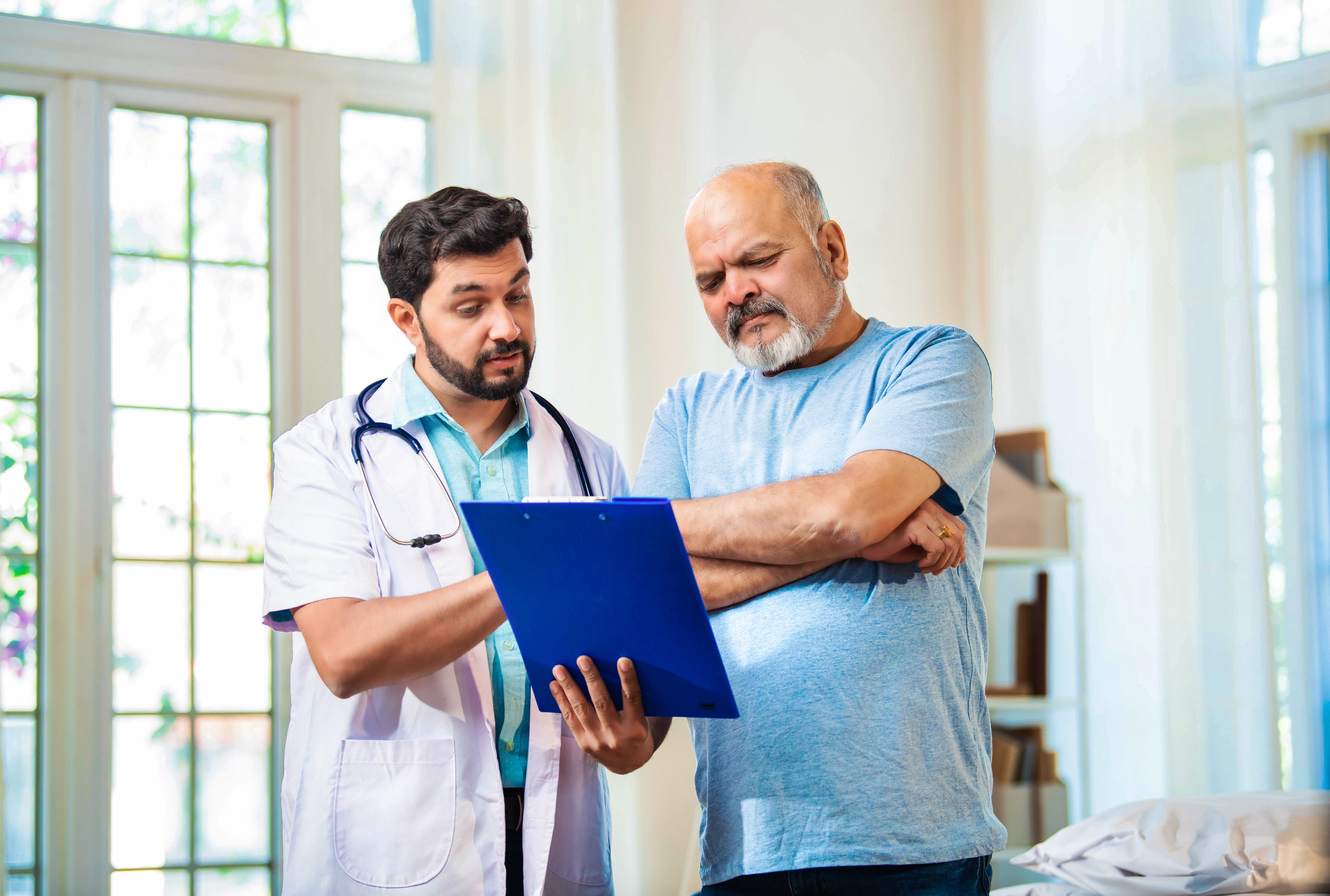 Doctor explaining liver cancer risk factors