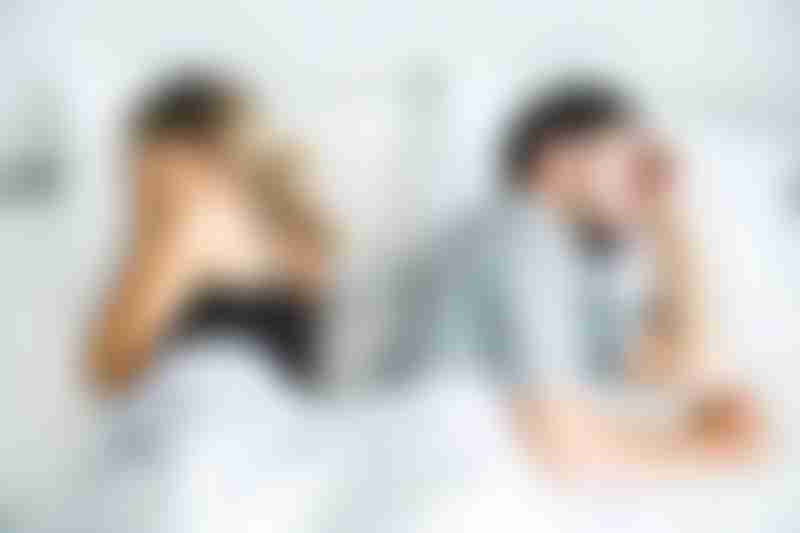 Man and Woman in Bed