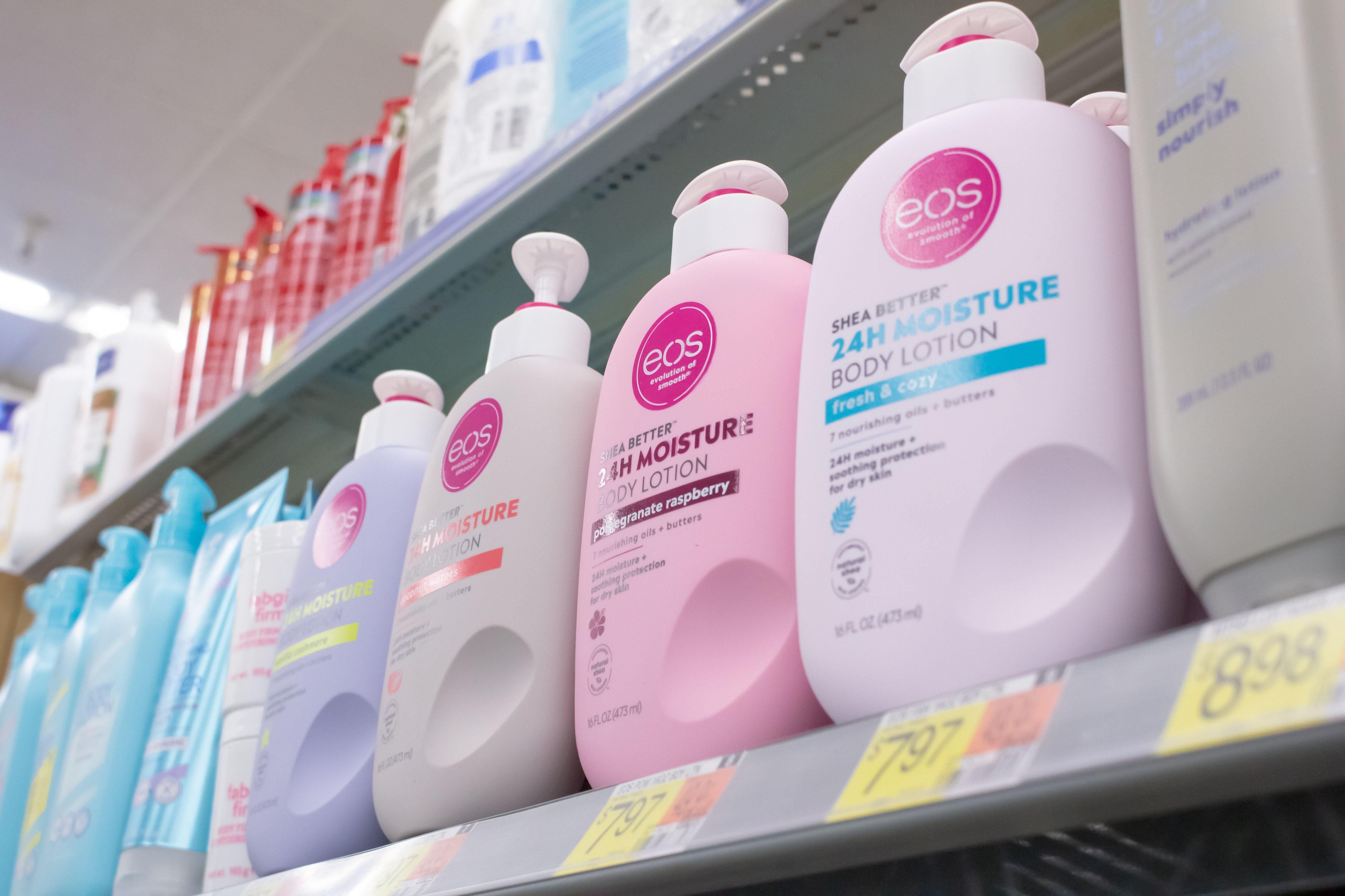 A view of several containers of Eos body lotion