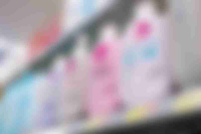 A view of several containers of Eos body lotion