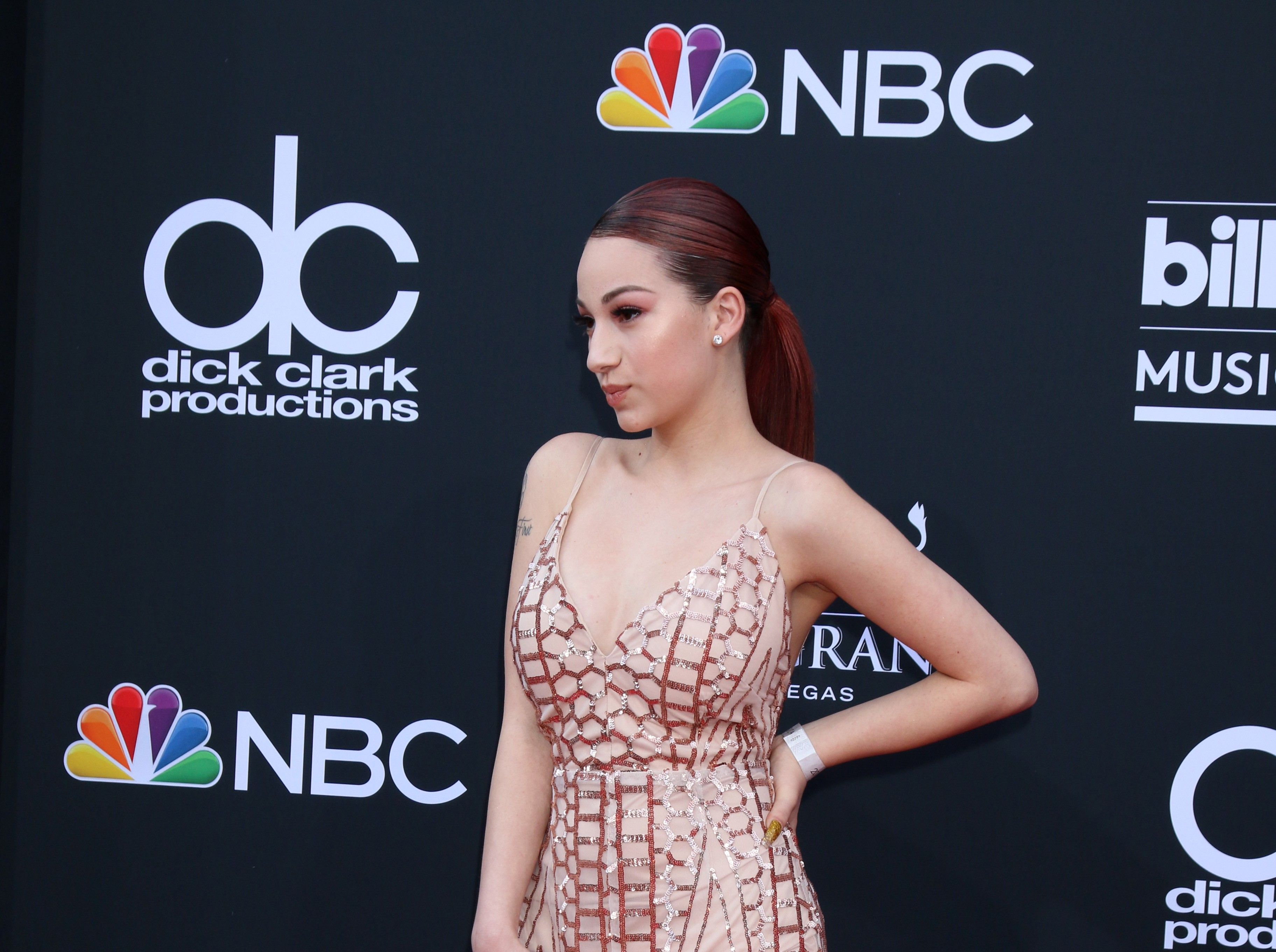 Bhad Bhabie posing at an event.