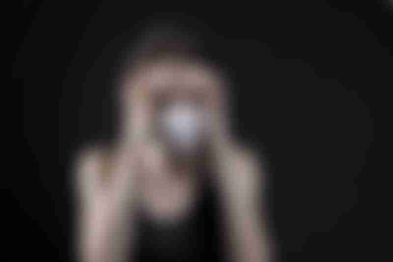 Woman with Headache