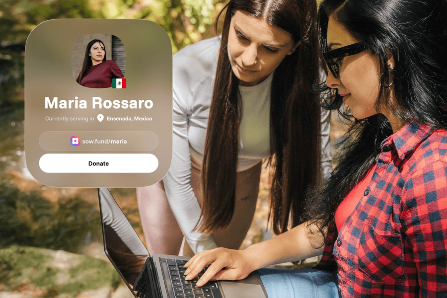 Two women looking at a laptop together outdoors, with a Sowfund missionary profile card for "Maria Rossaro — currently serving in Ensenada, Mexico" with a Donate button.
