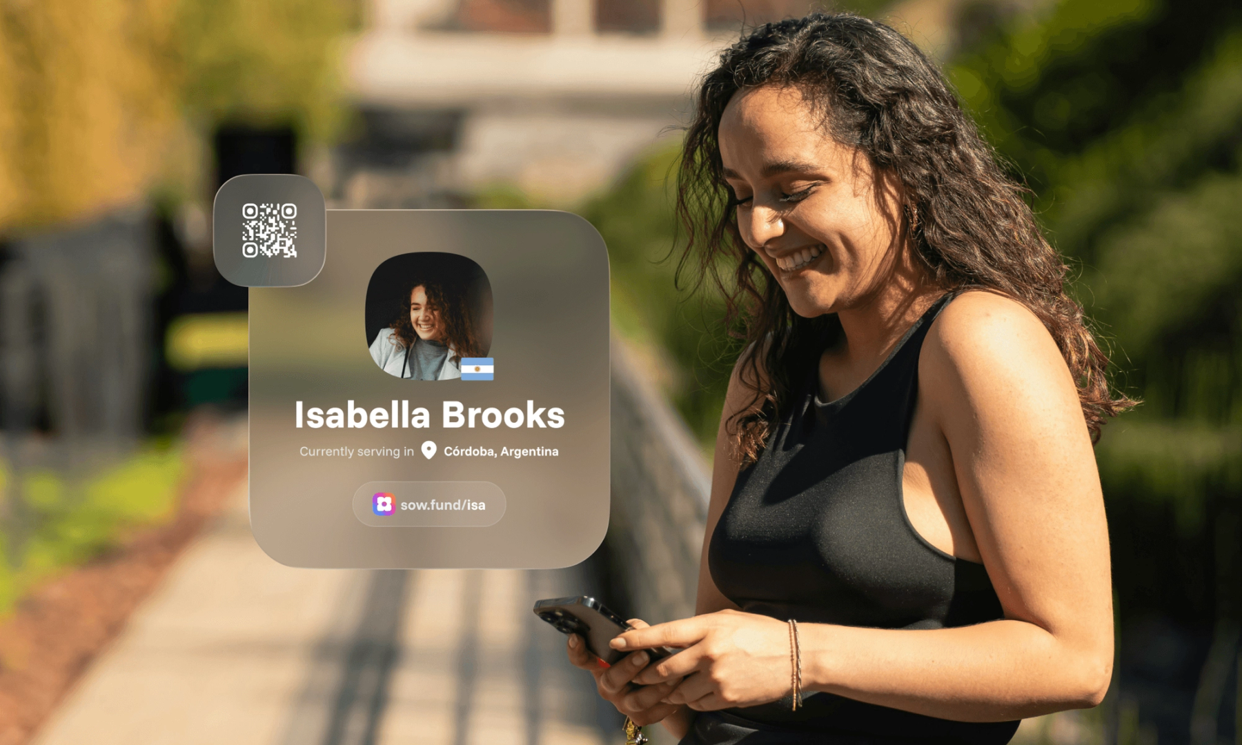 A smiling woman looking at her phone outdoors, alongside a sample Sowfund missionary profile card for "Isabella Brooks — currently serving in Córdoba, Argentina" with a QR code and shareable profile link.