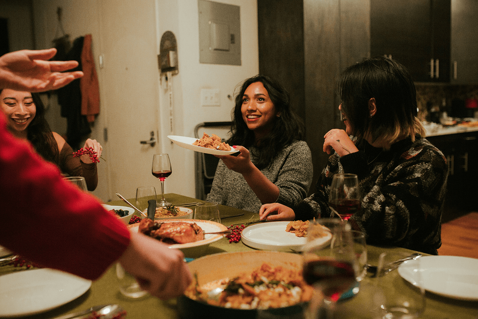 Christian friends sharing a meal