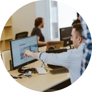 Man point at computer screen image