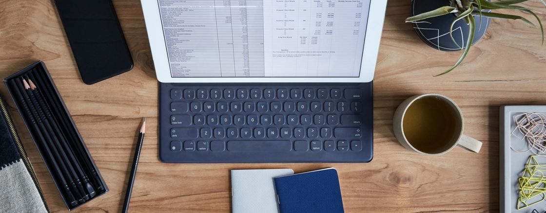 Spreadsheet on tablet on desk