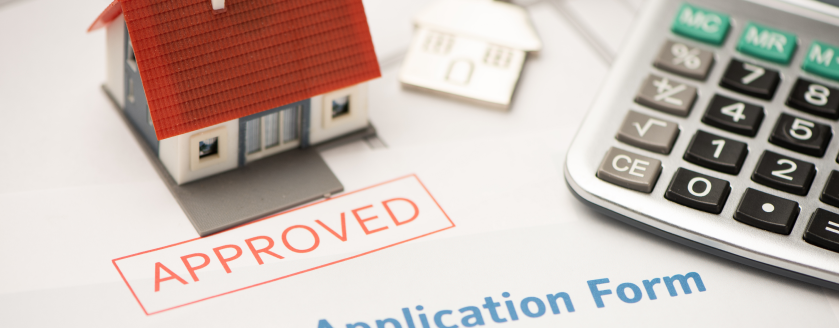 A stamp on paper that says, "Approved: Mortgage Application Form."