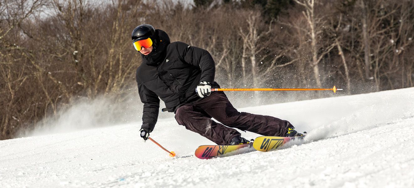 2023 Salomon QST 106 Skis: Full Width Action Image 2