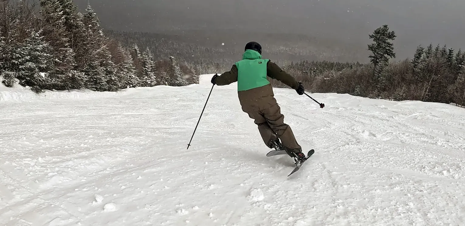 2027 Nordica Enforcer 94 On Snow Ski Review - Jeff Air Carving Action Shot