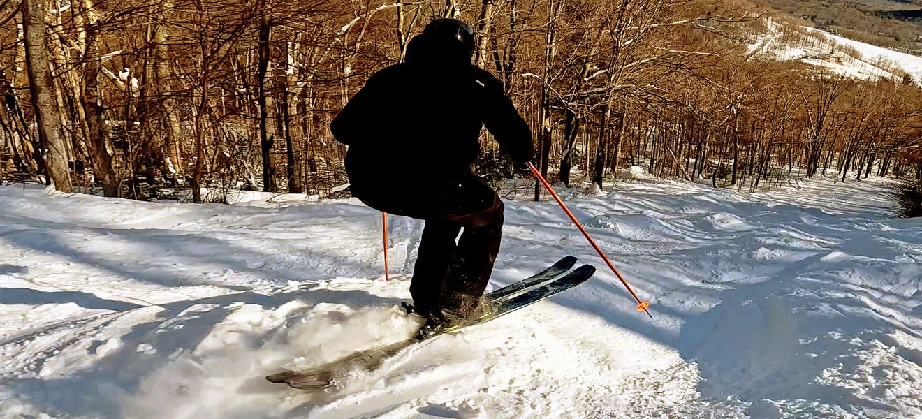 2023 Atomic Bent 90 Skis: Full Width Action Image 1