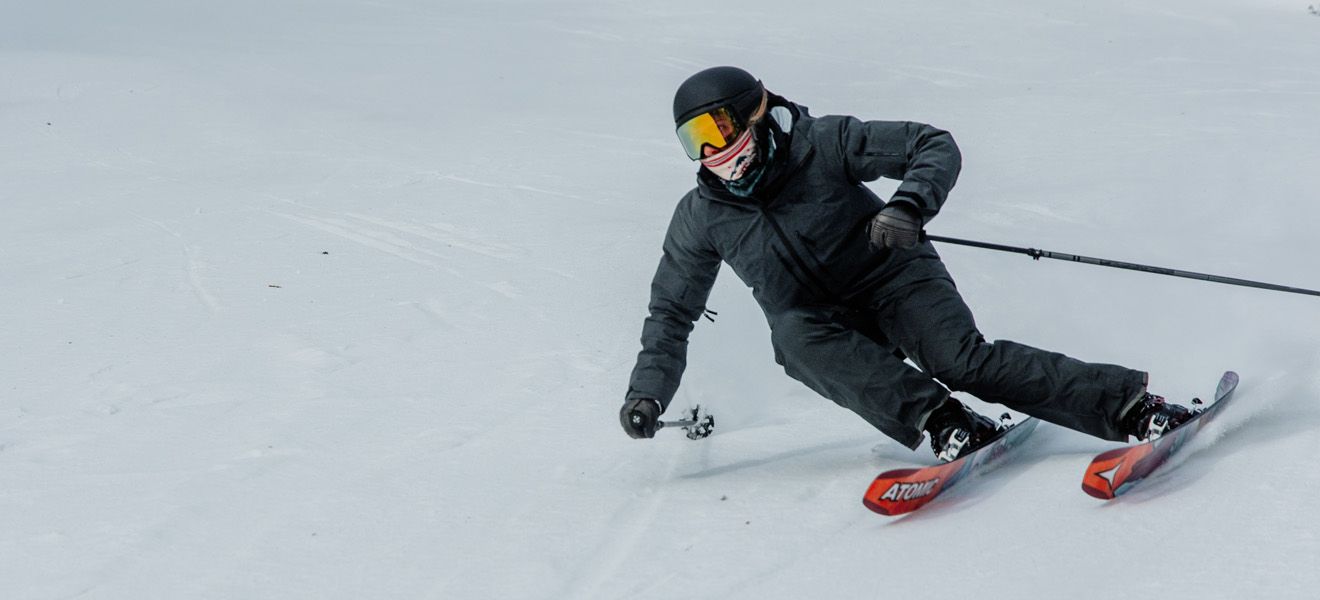 2023 Atomic Bent 110 Skis: Full Width Action Image 1