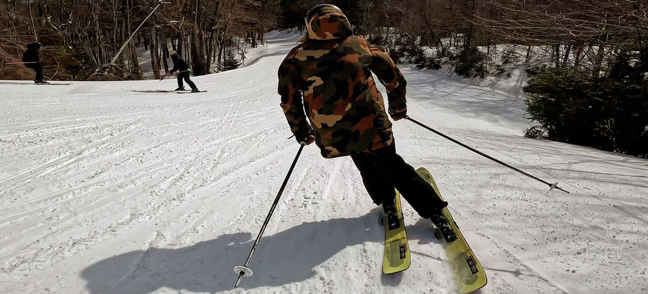 2023 Salomon QST Stella 106 Skis: Full Width Action Image 2