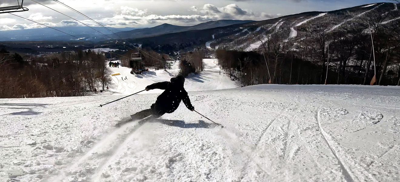 2023 Stockli Montero AX Skis: Full Width Action Image 1