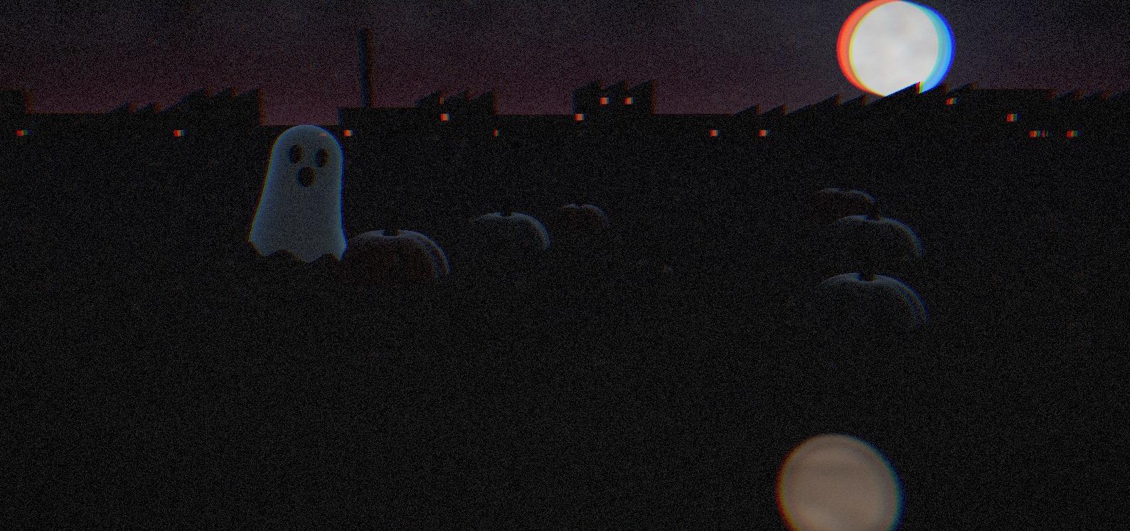 Un fantasma azzurro avanza nel campo buio di Accendi le zucche, tra le zucche ancora spente.