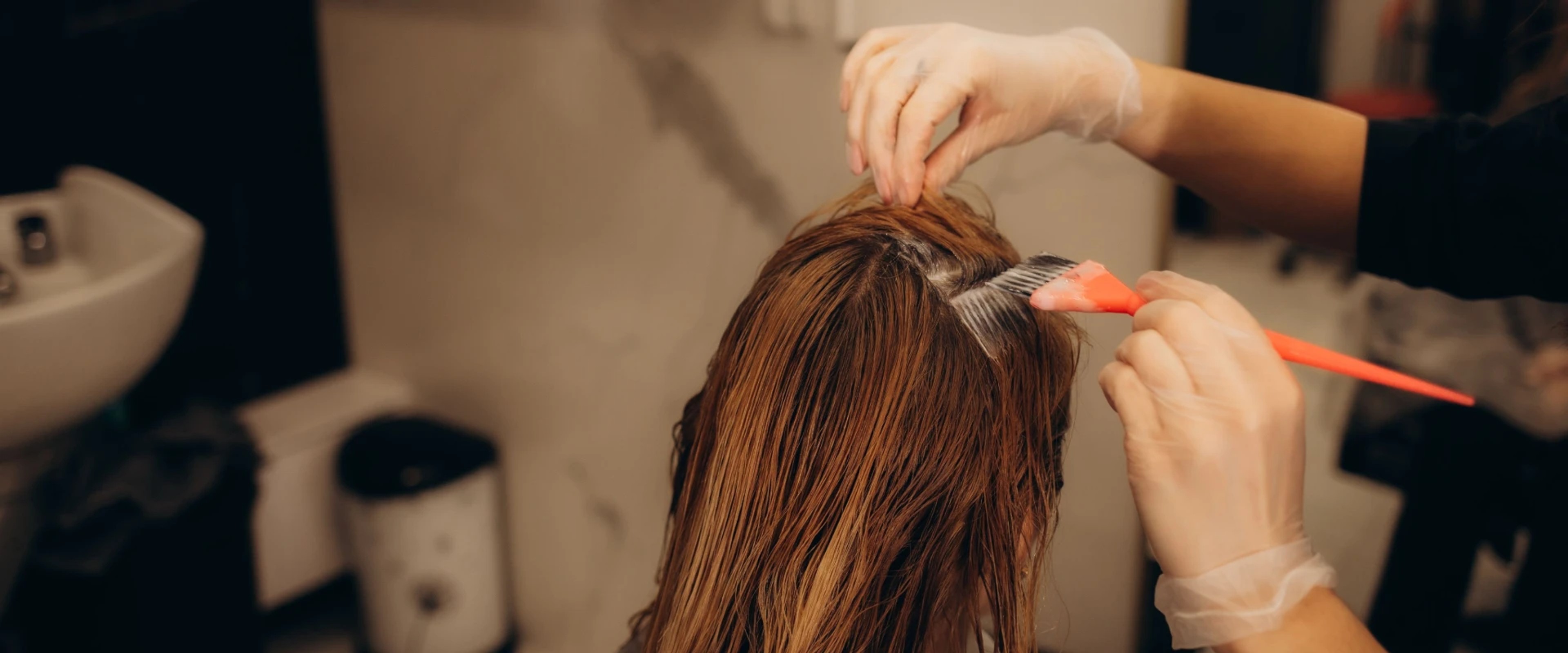Vinyl gloves for hair coloring in a salon, ensuring cleanliness and protection.