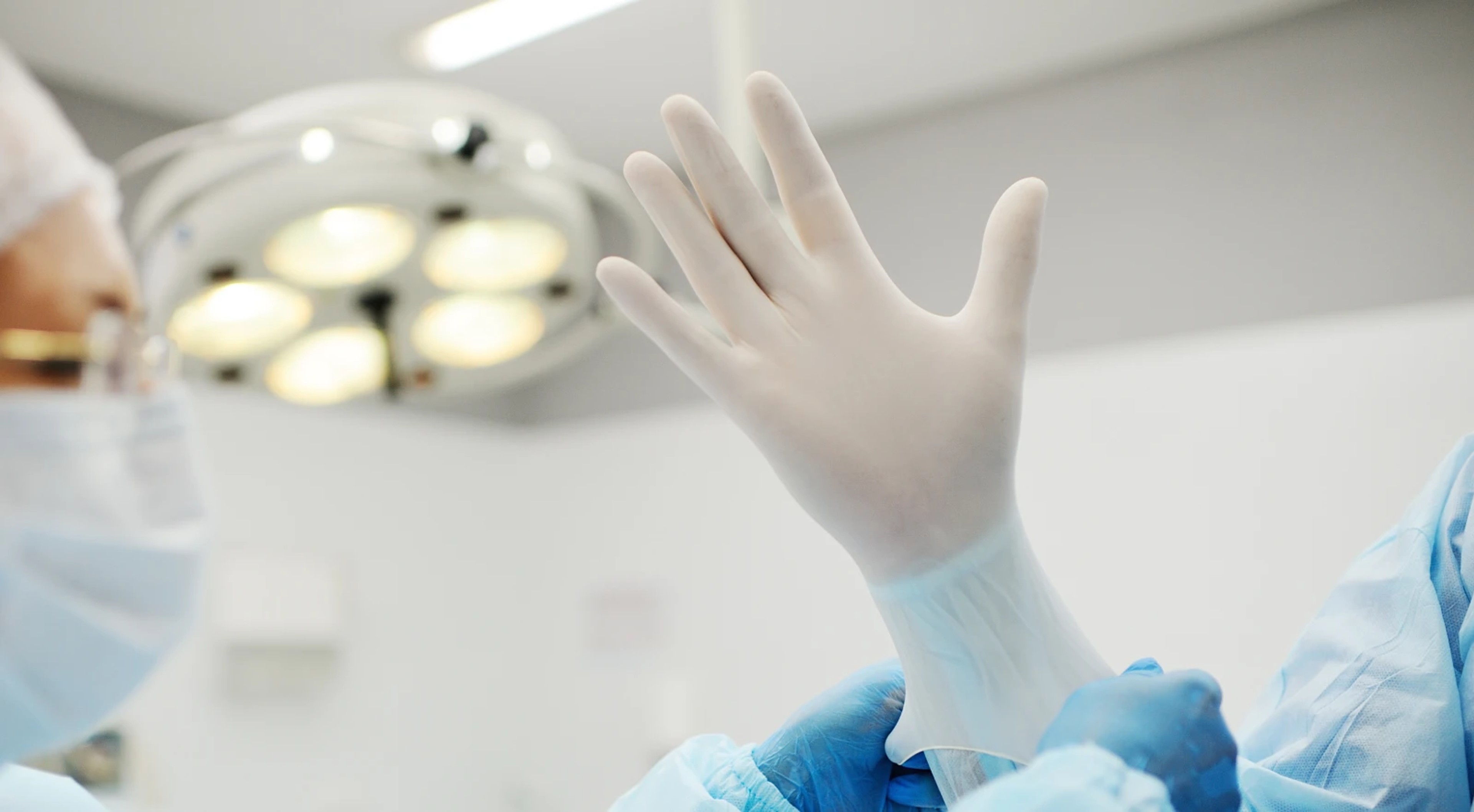 Synthetic latex gloves in a surgical setting