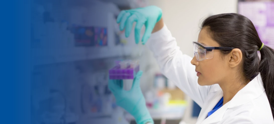 Researcher using ChemTuff gloves in a laboratory