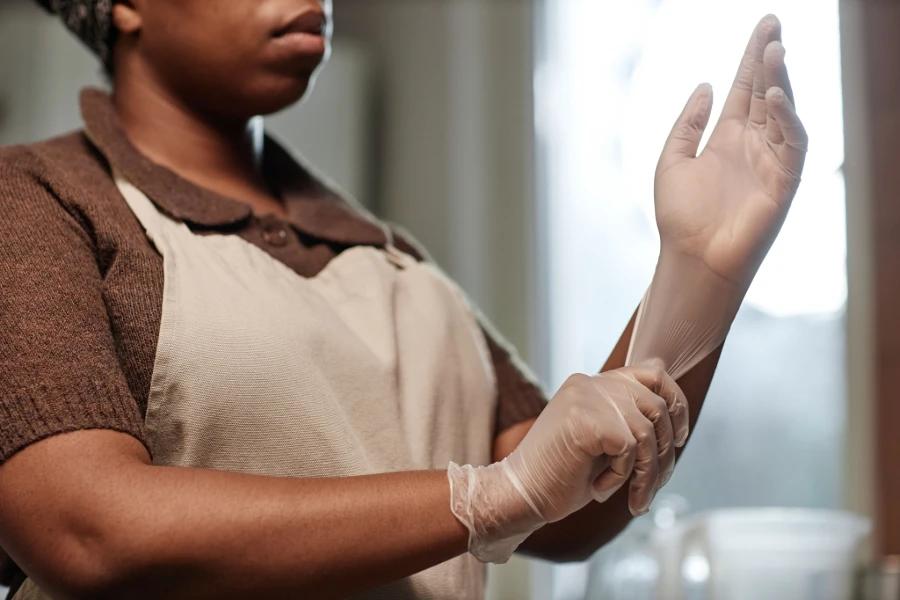 Vinyl gloves for kitchen tasks, ensuring hygiene while cooking or cleaning.