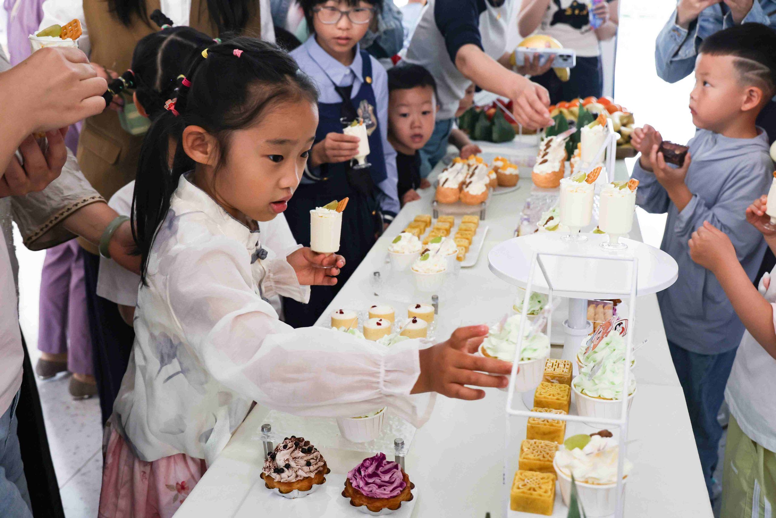 Classic candies, homemade cookies & drinks. Kids share treats, parents reminisce.