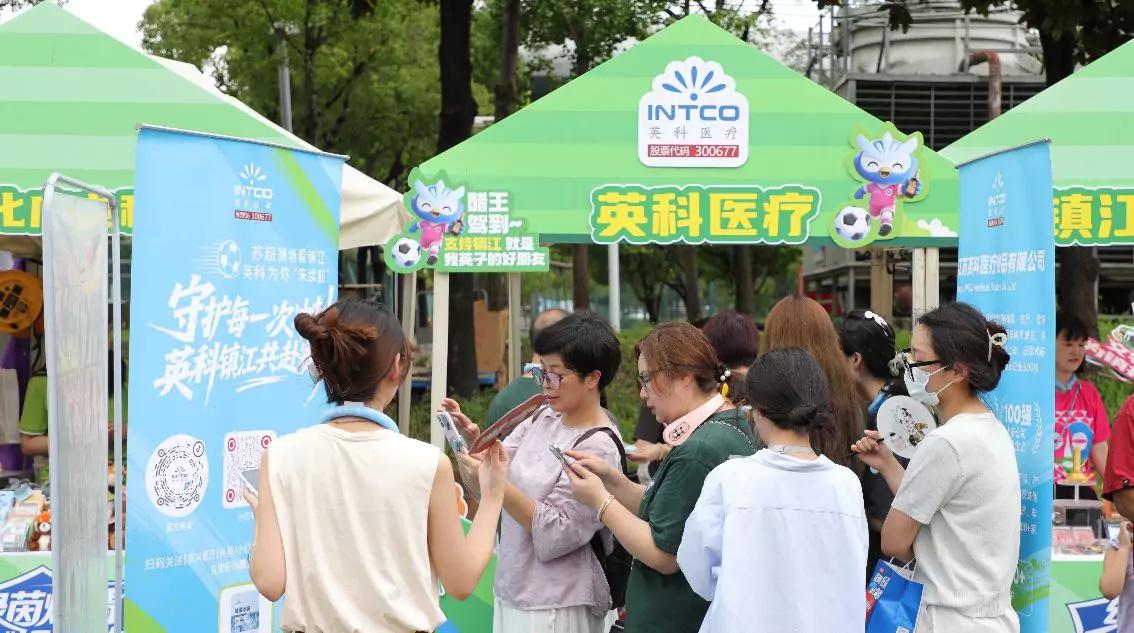 Intco Medical disposable gloves at outdoor community health event, promoting safety.
