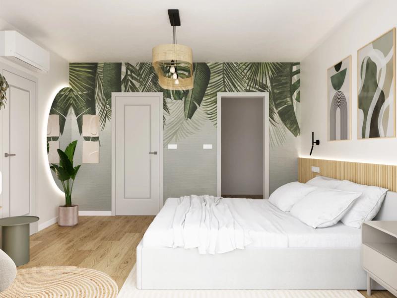 Drzwi z tłem z tapety. Okrągłe lustro z LED-owym podświetleniem odbija pokój i podwaja zieleń.